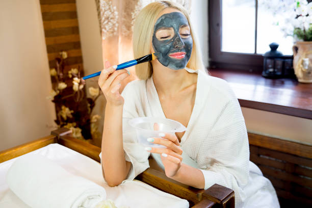 istock Girl put on face mask 668694612