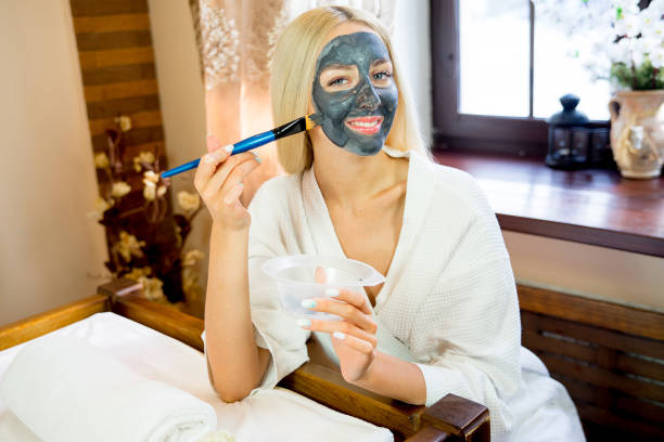 istock Girl put on face mask 668694696