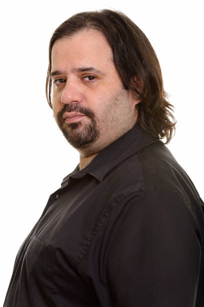 istock Face of overweight bearded man looking at camera against white background 668697594