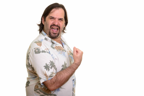 istock Happy overweight bearded tourist man smiling while looking motivated 668698768