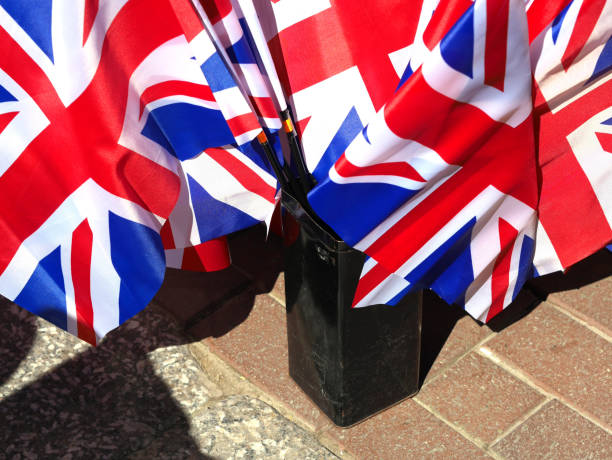 istock Bunch of Union Jacks 668707844