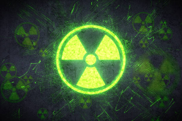 Radiation Warning Design A simple radiation warning design on a concrete wall. nuclear weapon stock pictures, royalty-free photos & images