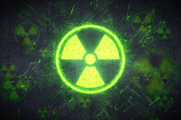 Radiation Warning Design A simple radiation warning design on a concrete wall. nuclear symbol stock pictures, royalty-free photos & images