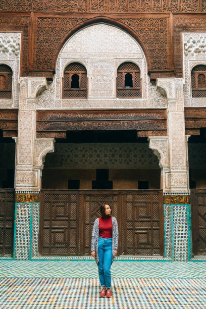 istock Woman standing inside riad in Morocco 668711072