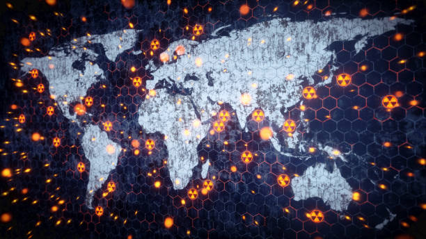 Worldwide Nuclear Conflict Concept A world map outline with glowing nuclear warning symbol scattered around. The world map is very dirty and scratched with glowing particles of dust exploding outward.


 weapons of mass destruction stock pictures, royalty-free photos & images