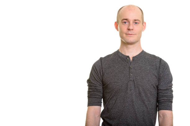 istock Studio shot of bald handsome man isolated against white background 668711756