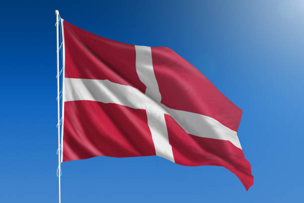 istock National flag of Denmark on clear blue sky 668712124