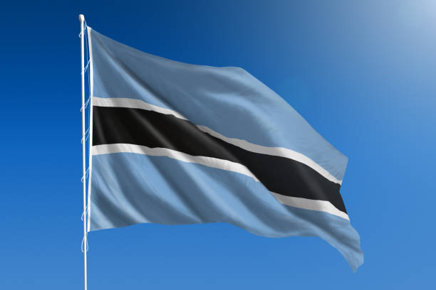 istock National flag of Botswana on clear blue sky 668712532
