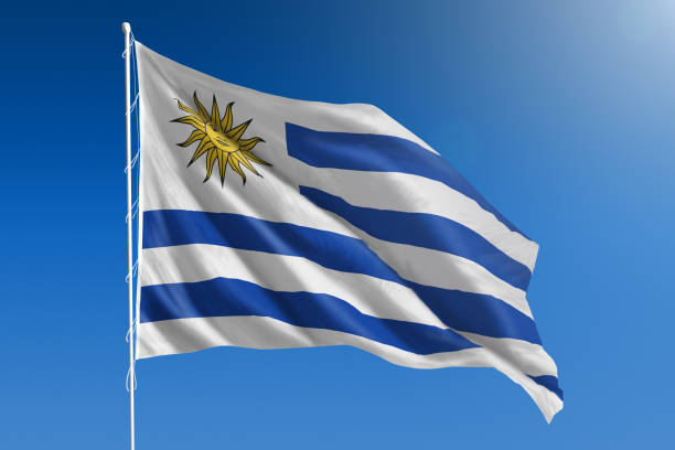 ウルグアイの国旗澄んだ青い空 - uruguayan flag ストックフォトと画像