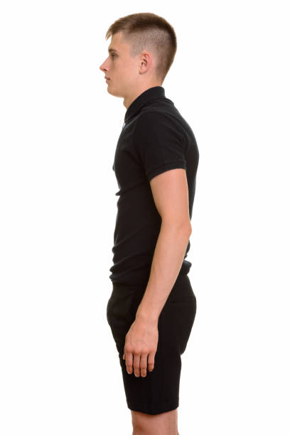 istock Profile view of young handsome man standing 668718640