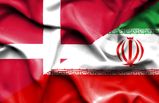 istock Waving flag of Iran and Denmark 668721628