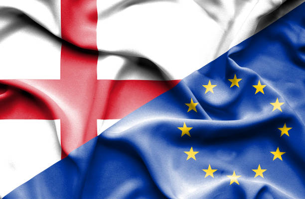 istock Waving flag of European Union and England 668723610