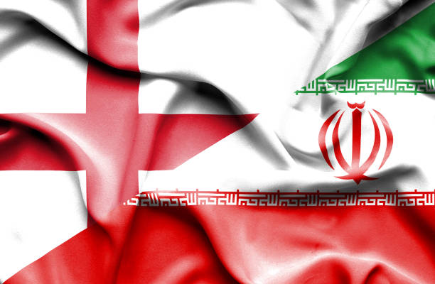 istock Waving flag of Iran and England 668723676