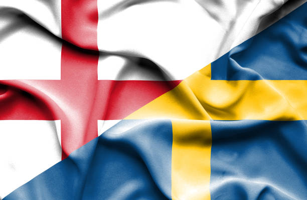 istock Waving flag of Sweden and England 668723984