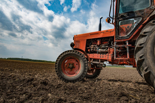 istock Old, rusty tractor. Farming machinery. 668729166