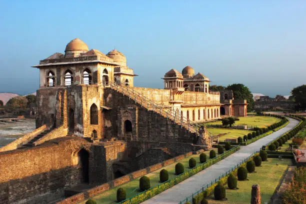 Jahaz Mahal (called Ship Palace in english) in Mandu, Madhya Pradesh state of India. It was named so as it appears as a ship floating in water. It was built by Sultan Ghiyas-ud-din-Khilji during 14th Century and it served as a harem for the sultan.