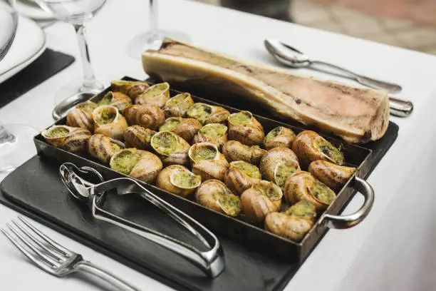 Bourgogne Escargots, Snails with herbs butter, with marrow on plate of slate