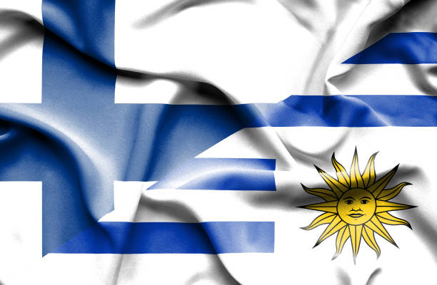 istock Waving flag of Uruguay and Finland 668730404
