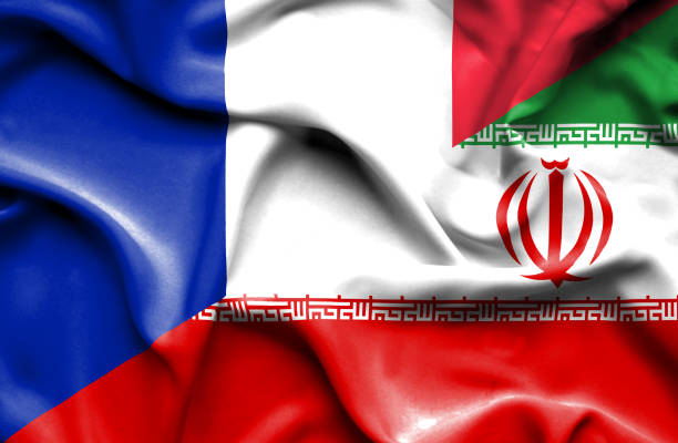 istock Waving flag of Iran and France 668730818