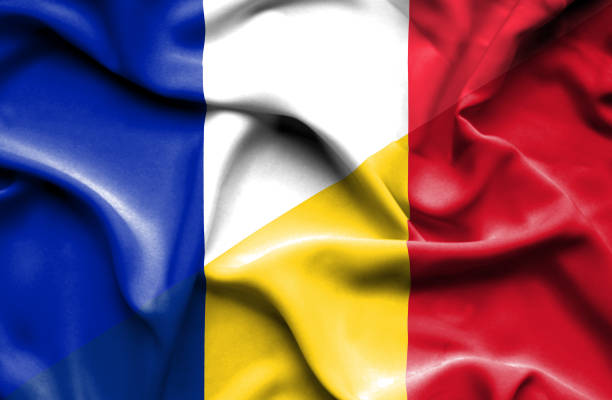 istock Waving flag of Romania and France 668731066