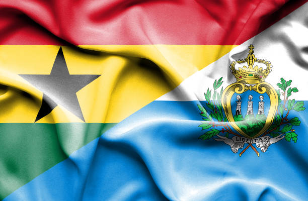 istock Waving flag of San Marino and Ghana 668736308