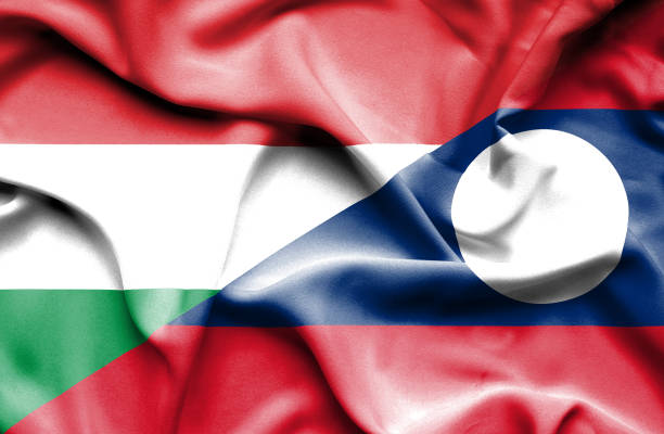 istock Waving flag of Laos and Hungary 668736706
