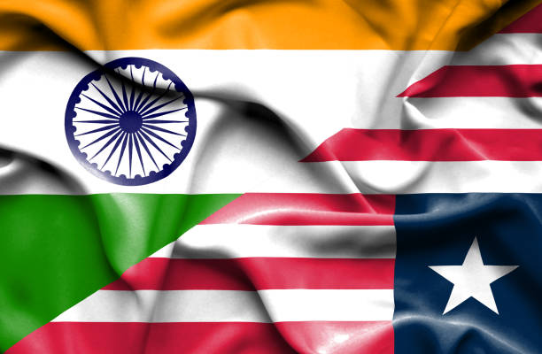 istock Waving flag of Liberia and India 668739900