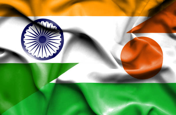 istock Waving flag of Niger and India 668739996