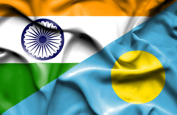 istock Waving flag of Palau and India 668740022