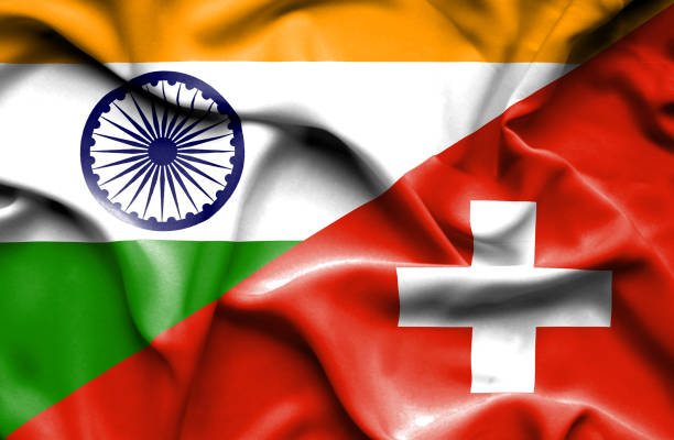 istock Waving flag of Switzerland and India 668740098