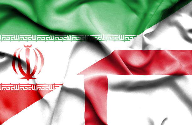 istock Waving flag of England and Iran 668740954