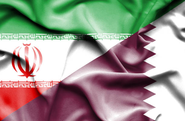 istock Waving flag of Qatar and Iran 668741206