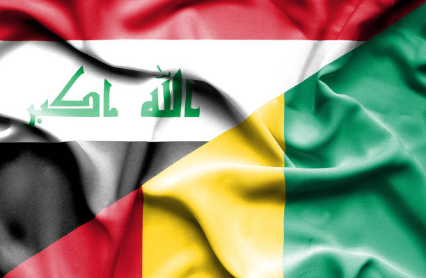 istock Waving flag of Guinea and Iraq 668741568