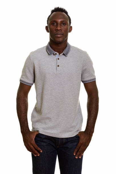 istock Young black African man standing with hands in pockets 668743806