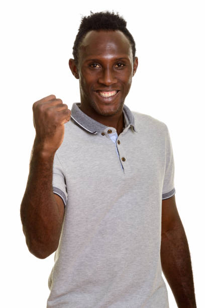 istock Young happy African man smiling and looking motivated 668744040