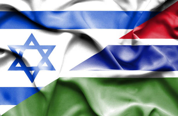istock Waving flag of Gambia and Israel 668744748