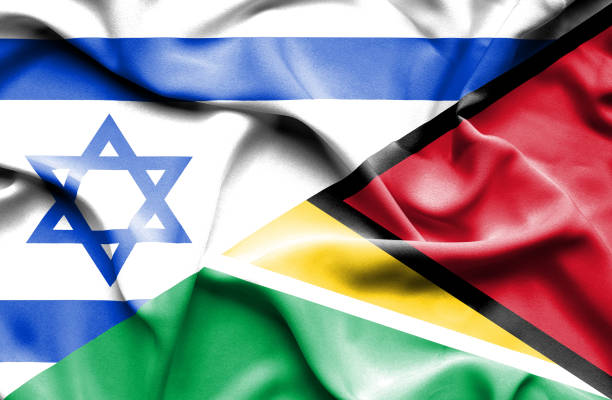 istock Waving flag of Guyana and Israel 668744782