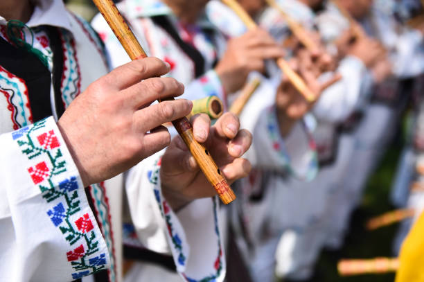 istock Traditional singing at wooden flutes 668744804