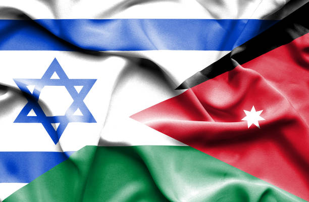 istock Waving flag of Jordan and Israel 668744832