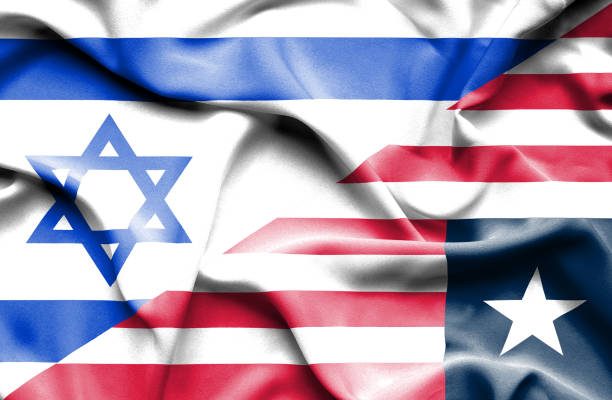 istock Waving flag of Liberia and Israel 668744880