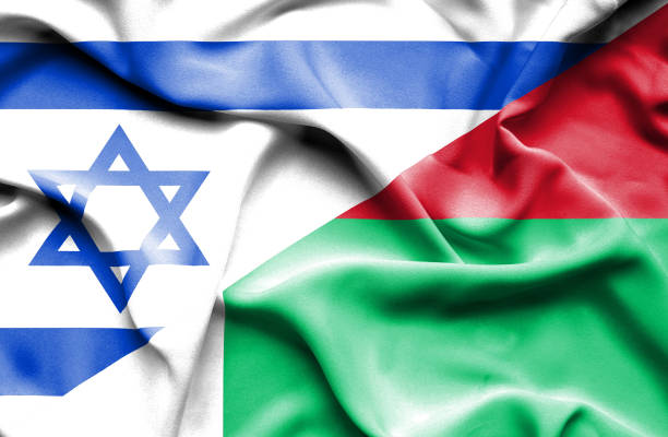 istock Waving flag of Madagascar and Israel 668744924
