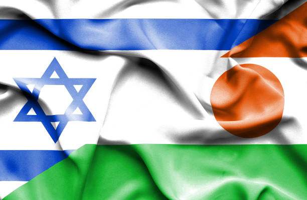 istock Waving flag of Niger and Israel 668744978