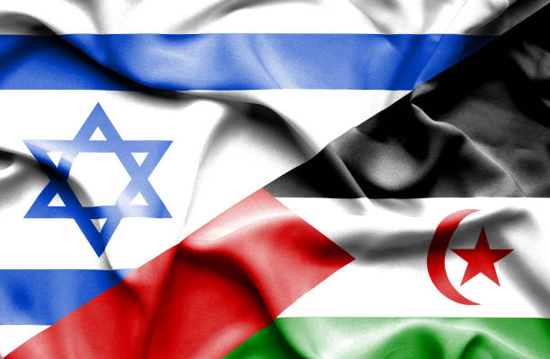 istock Waving flag of Western Sahara and Israel 668745148