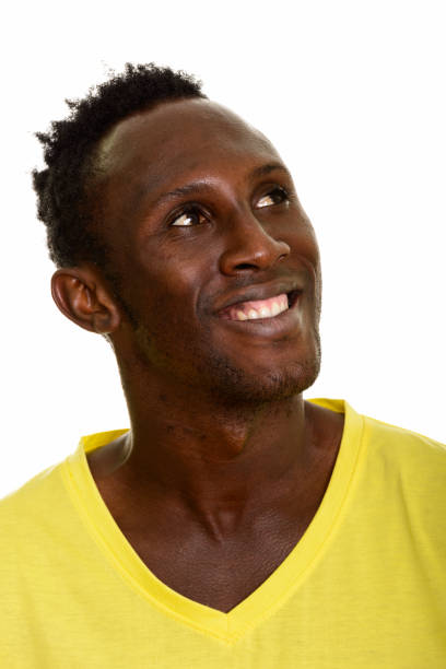 istock Face of young happy African man smiling and thinking 668745562