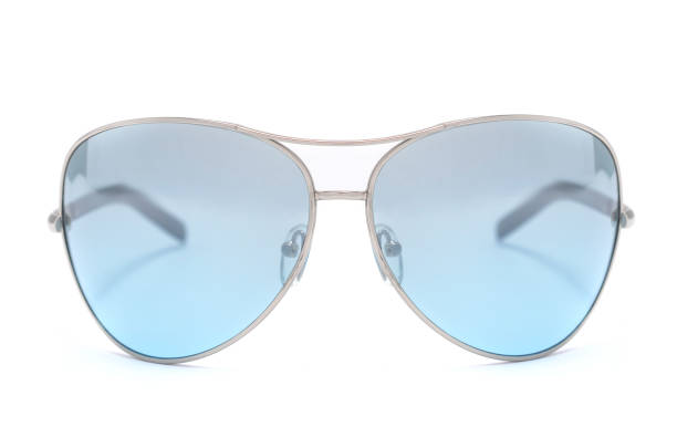 istock Sunglasses with blue glass in an iron frame isolated on white 668746038