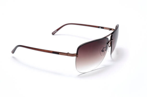 istock Sunglasses with brown glass isolated on white 668746190