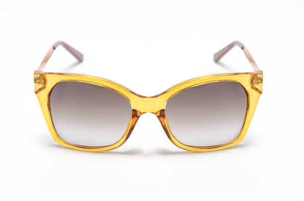 istock Sunglasses in a transparent yellow frame isolated on white 668748662