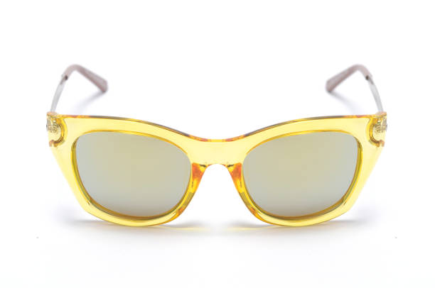 istock Sunglasses in a transparent yellow frame isolated on white 668750500