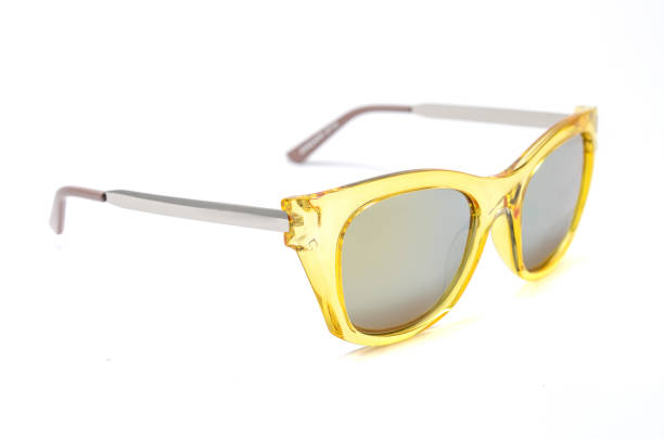 istock Sunglasses in a transparent yellow frame isolated on white 668750504
