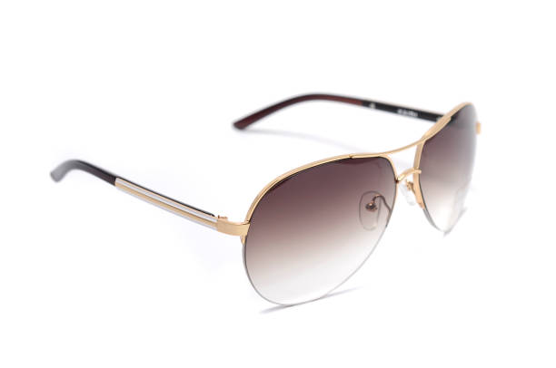 istock Sunglasses in an iron frame with brown glass isolated on white 668750734